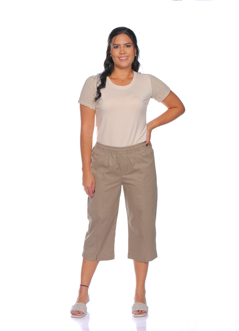 33277A capri silueta ajustada, pretina resortada,corte delantero.