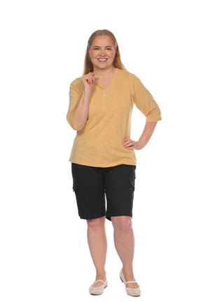 Camiseta cuello V silueta amplía 23790B