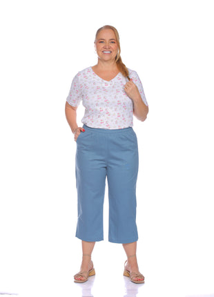 33827B, capri silueta amplia, tela dril, bordado en bolsillos.