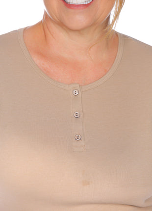 blusón silueta amplia, cuello redondo.