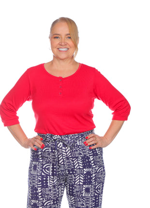 blusón silueta amplia, cuello redondo.