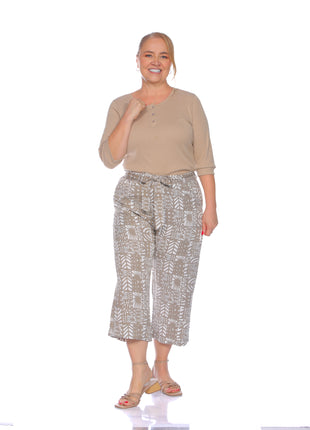 blusón silueta amplia, cuello redondo.