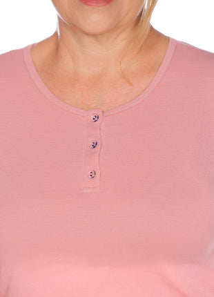 blusón silueta amplia, cuello redondo.