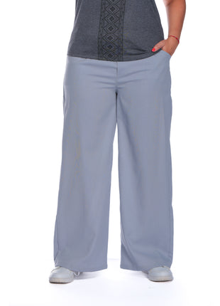 43605M Pantalón silueta amplia, pretina resortada, tela fresca, textura lino.