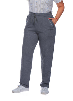 43740B Pantalón silueta amplia, pretina elástica, bordados bolsillos.