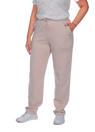 43740B Pantalón silueta amplia, pretina elástica, bordados bolsillos.